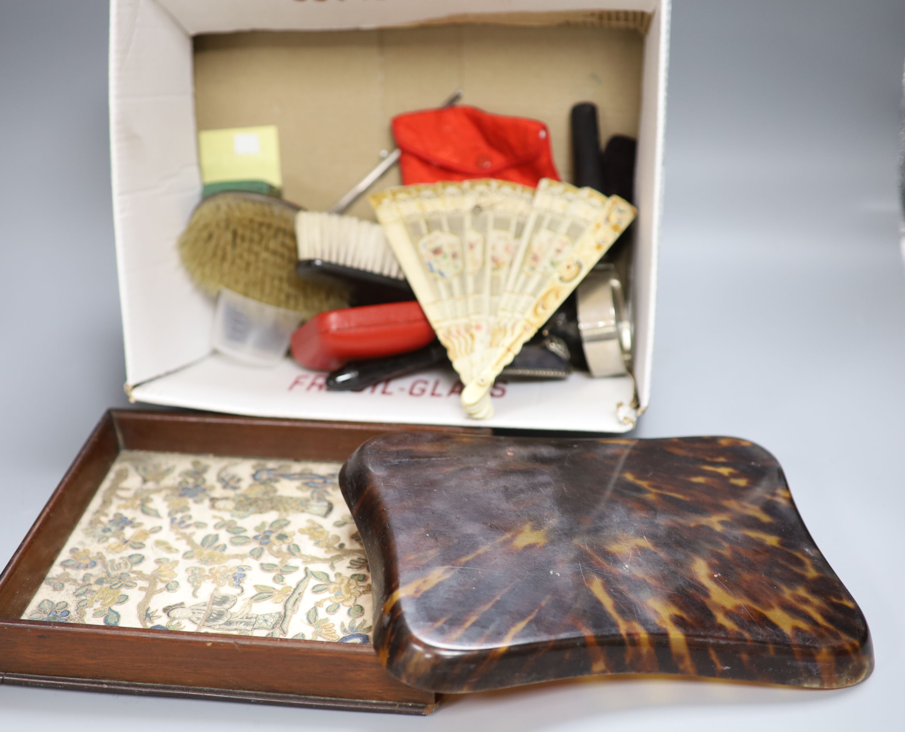A quantity of mixed collectables including a tortoiseshell tray, a Chinese needlework, a silver paperknife, fans, jewellery boxes, etc.